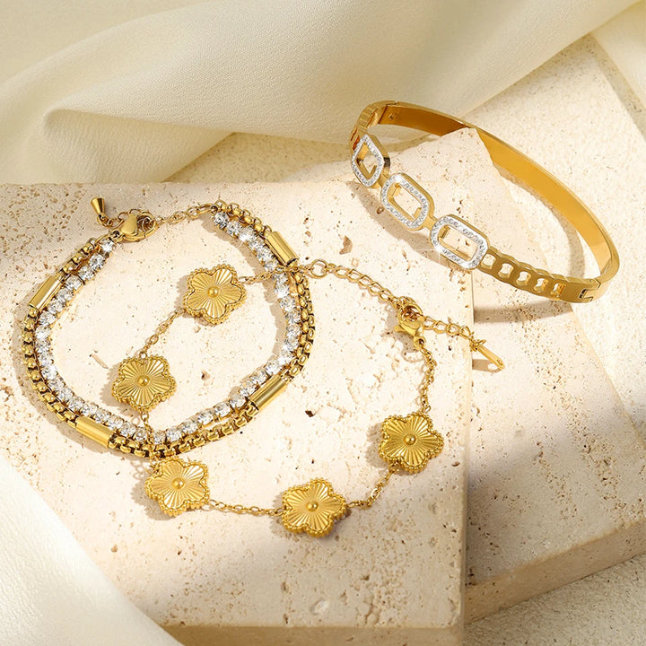 ZAKOL 3Pcs Gold Stainless Steel Bracelet Set for Women – Elegant Geometric Five-Leaf Flower Zircon Bangles