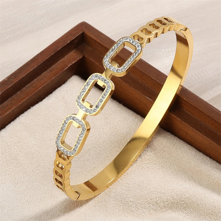 ZAKOL 3Pcs Gold Stainless Steel Bracelet Set for Women – Elegant Geometric Five-Leaf Flower Zircon Bangles